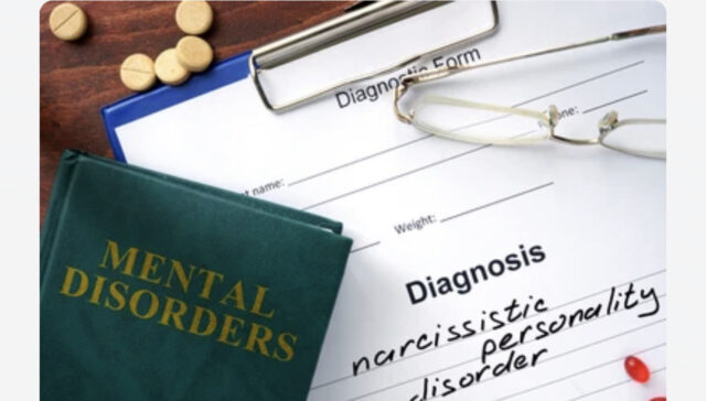 A medical record with a diagnosis and pills on it.